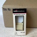 Box Led Nitelight/switch Ivory, Partno 7738v-box, By Cooper Wiring Devices Inc,. Fixed Price $11.99.