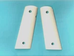 A. = 580 Colt Or Clone Pistol Sim Ivory Grips Very, Very Nice. Fixed Price $40.00.