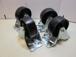 (4) E.r. Wagner 1-1/2" X 4" Cast Iron Rigid Plate Casters 450lb. Load Rating New. Fixed Price $37.95.