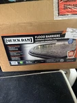 Quick Dam Water Activated 10 Ft. Flood Barrier 8-pack New D610-8 Sealed Case. Fixed Price $85.00.