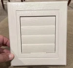 Novik Dryer Vent Mounting Block 7.6" W X 8.4" Adjustable Depth Sandstone. Fixed Price $15.98.