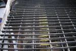 19-w-4 Space Welded Torch Cut Steel Bar Grating - 12" X 35 3/4" Painted Black. Fixed Price $50.00.