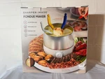 Sharper Image Fondue Maker W/ Colorful Forks - Model 1017244 New. Fixed Price $49.88.